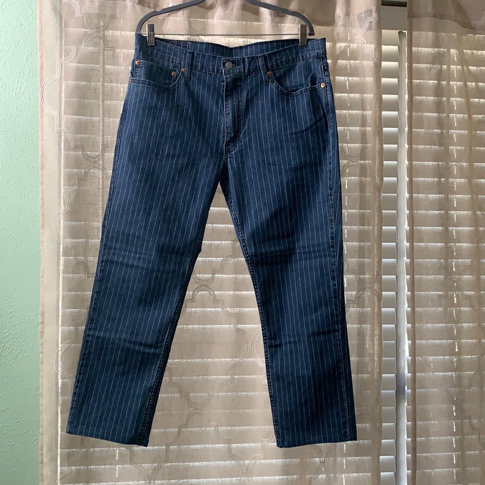 Levi white striped denim jeans